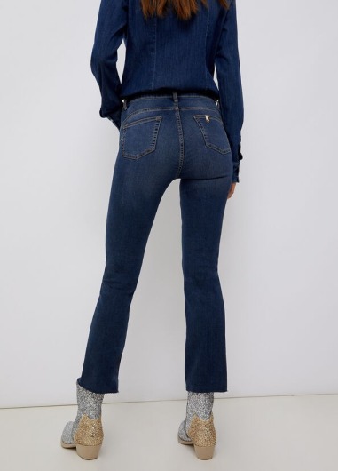 Vaqueros tobilleros con bajo deshilachado UA2040