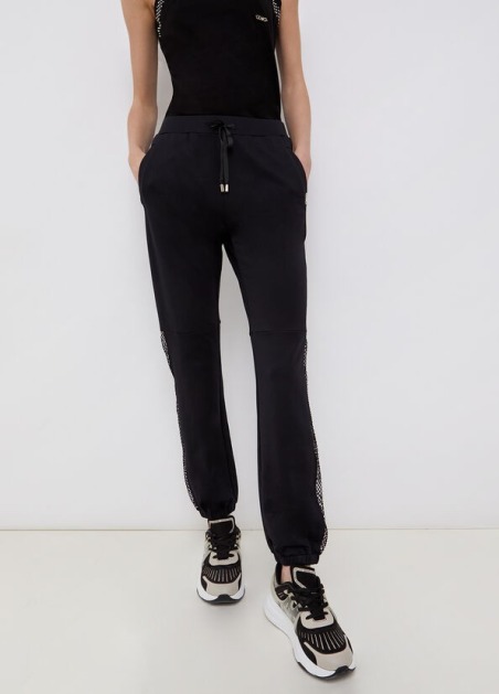 Pantalón con inserciones de malla TA2112